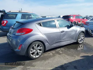 2016 Hyundai Veloster z VIN KMHTC6AD1GU286674, wystawiony jako IAAI lot #41627128 z przebiegiem 71 617 mil mil oraz . Historia ofert i sprzedaży dostępna na DreamBid. Obrazek 14.