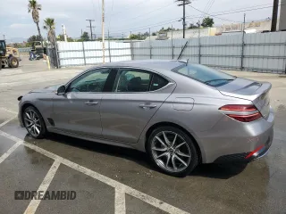2023 Genesis G70 2.0T with VIN KMTG34TA0PU123657, listed as a Copart auction lot 72560954 with 26,678 mi miles and Salvage Title. Bid and sale history available at carsss.com. Image 2.