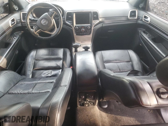 2014 Jeep Grand Cherokee Limited z VIN 1C4RJFBG8EC129868, wystawiony jako Copart lot #86781534 z przebiegiem 99 316 mil mil oraz Szkoda całkowita • Salvage title. Historia ofert i sprzedaży dostępna na DreamBid. Obrazek 8.