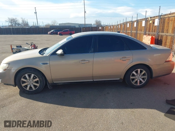 2008 Ford Taurus SEL with VIN 1FAHP24W38G111319, listed as a IAAI auction lot 41585092 with 216,419 mi miles. Bid and sale history available at carsss.com. Image 14.
