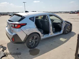 2024 Subaru Crosstrek z VIN JF2GUABC6RH243490, wystawiony jako Copart lot #57110855 z przebiegiem 15 415 mil mil oraz Szkoda całkowita • Salvage title. Historia ofert i sprzedaży dostępna na DreamBid. Obrazek 3.