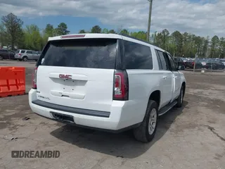 2019 GMC Yukon XL SLT with VIN 1GKS2GKC3KR160900, listed as a IAAI auction lot 41987464 with 88,854 mi miles and . Bid and sale history available at carsss.com. Image 4.