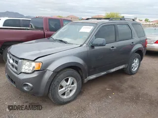 2009 Ford Escape XLS with VIN 1FMCU92769KD15656, listed as a IAAI auction lot 42185560 with 110,792 mi miles and . Bid and sale history available at DreamBid. Image 2.