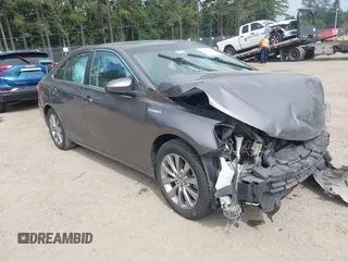 2015 Toyota Camry LE z VIN 4T1BD1FK3FU158471, wystawiony jako IAAI lot #42433828 z przebiegiem 62 796 mil mil oraz . Historia ofert i sprzedaży dostępna na DreamBid. Obrazek 1.