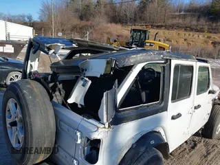 2021 Jeep Wrangler Unlimited Sport S with VIN 1C4HJXDG8MW841292, listed as a IAAI auction lot 41431503 with Not Provided miles and . Bid and sale history available at DreamBid. Image 6.