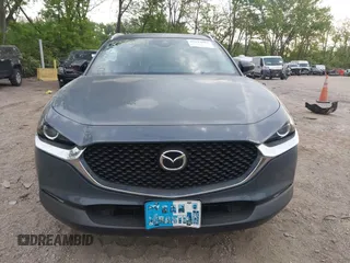 2023 Mazda CX-30 S Carbon Edition with VIN 3MVDMBCM4PM577619, listed as a IAAI auction lot 42219801 with 24,784 mi miles and . Bid and sale history available at DreamBid. Image 12.