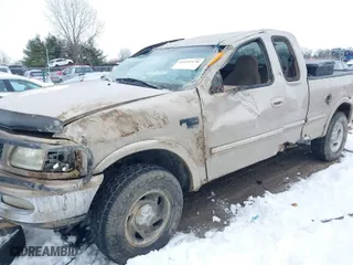 1998 Ford F-150 Standard with VIN 1FTZX18W4WNB04665, listed as a IAAI auction lot 41255136 with 182,272 mi miles. Bid and sale history available at carsss.com. Image 6.