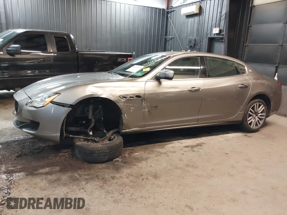 2015 Maserati Quattroporte S Q4 z VIN ZAM56RRAXF1158381, wystawiony jako IAAI lot #39717772 z przebiegiem 100 836 mil mil oraz . Historia ofert i sprzedaży dostępna na DreamBid. Obrazek 6.
