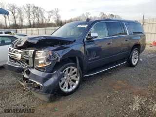 2017 Chevrolet Suburban Premier with VIN 1GNSKJKCXHR275776, listed as a Copart auction lot 42389185 with 102,920 mi miles and Salvage Title. Bid and sale history available at carsss.com. Image 1.