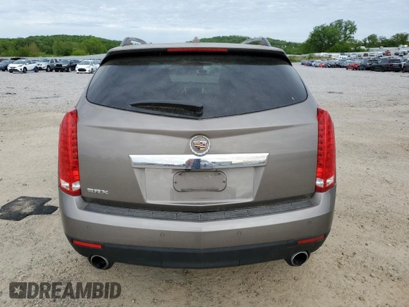 2011 Cadillac SRX Luxury Collection z VIN 3GYFNAEY8BS619208, wystawiony jako Copart lot #58321585 z przebiegiem 176 560 mil mil oraz Nie do naprawy • Non repairable. Historia ofert i sprzedaży dostępna na DreamBid. Obrazek 6.