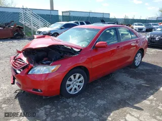 2007 Toyota Camry CE with VIN JTNBE46K573115563, listed as a IAAI auction lot 41971937 with 132,427 mi miles. Bid and sale history available at carsss.com. Image 2.