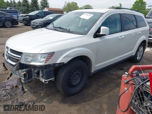 2012 Dodge Journey SXT with VIN 3C4PDCBG4CT372642, listed as a IAAI auction lot 42238499 with 172,033 mi miles and . Bid and sale history available at DreamBid. Image 2.
