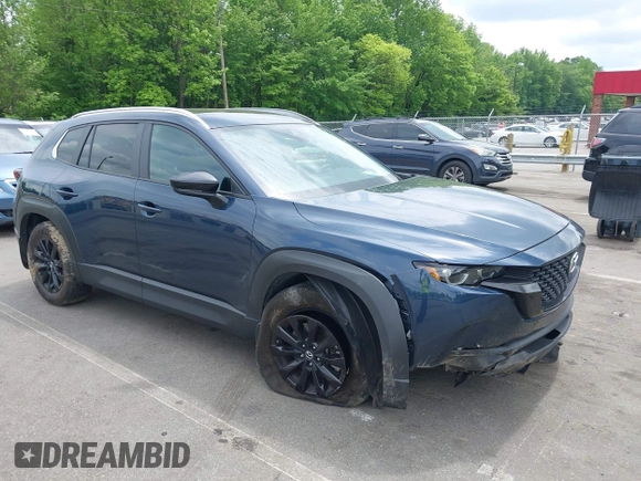2023 Mazda CX-50 S Preferred Plus z VIN 7MMVABCM4PN119583, wystawiony jako IAAI lot #42108949 z przebiegiem 26 254 mil mil oraz . Historia ofert i sprzedaży dostępna na DreamBid. Obrazek 1.