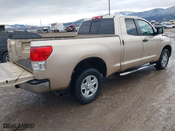 2010 Toyota Tundra 4WD Truck with VIN 5TFUY5F13AX111223, listed as a IAAI auction lot 41109896 with 238,591 mi miles. Bid and sale history available at carsss.com. Image 4.