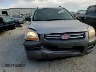2005 Kia Sportage LX with VIN KNDJF723457132535, listed as a Copart auction lot 52460445 with 180,110 mi miles and Salvage Title. Bid and sale history available at carsss.com. Image 11.