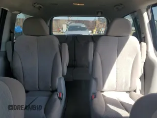 2011 Kia Sedona LX with VIN KNDMG4C75B6410550, listed as a Copart auction lot 76997744 with 74,659 mi miles and Salvage Title. Bid and sale history available at carsss.com. Image 10.