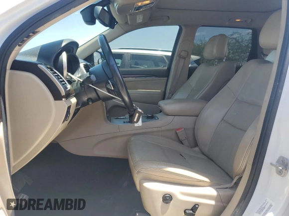 2014 Jeep Grand Cherokee Limited with VIN 1C4RJFBT2EC471846, listed as a Copart auction lot 63637415 with 130,262 mi miles and Salvage title. Bid and sale history available at DreamBid. Image 7.