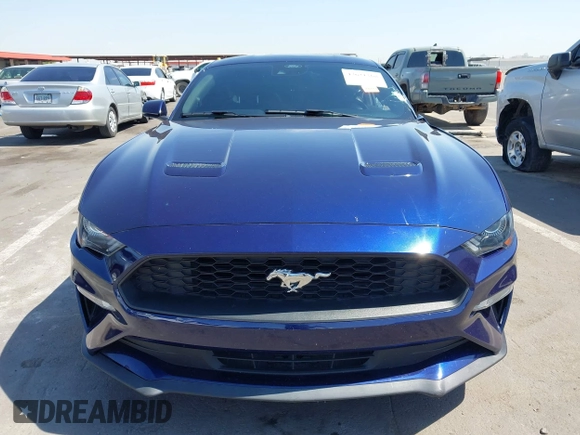 2020 Ford Mustang EcoBoost z VIN 1FA6P8TH7L5182508, wystawiony jako IAAI lot #42621368 z przebiegiem 75 597 mil mil oraz . Historia ofert i sprzedaży dostępna na DreamBid. Obrazek 12.