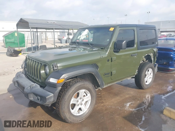 2021 Jeep Wrangler Sport with VIN 1C4GJXAN5MW852653, listed as a IAAI auction lot 42073214 with 53,834 mi miles and . Bid and sale history available at DreamBid. Image 2.