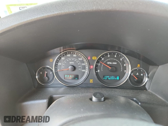 2007 Jeep Commander Sport z VIN 1J8HG48P47C691235, wystawiony jako Copart lot #64057505 z przebiegiem 135 641 mil mil oraz Szkoda całkowita • Salvage title. Historia ofert i sprzedaży dostępna na DreamBid. Obrazek 9.