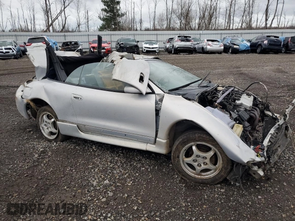 1997 Mitsubishi Eclipse GS with VIN 4A3AX35G5VE160888, listed as a Copart auction lot 80085414 with 163,683 mi miles and Salvage Title. Bid and sale history available at carsss.com. Image 4.