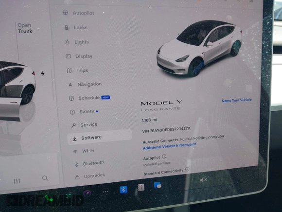 2025 Tesla Model Y Long Range with VIN 7SAYGDED6SF234278, listed as a IAAI auction lot 41781695 with 1,168 mi miles and . Bid and sale history available at DreamBid. Image 7.