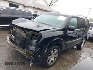 2014 Honda Pilot Touring with VIN 5FNYF4H91EB055741, listed as a IAAI auction lot 42006752 with 222,308 mi miles and . Bid and sale history available at carsss.com. Image 18.