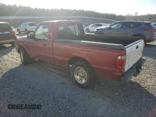 2001 Ford Ranger XL with VIN 1FTYR10C91TA26959, listed as a Copart auction lot 86453044 with 303,676 mi miles and Salvage title. Bid and sale history available at DreamBid. Image 2.