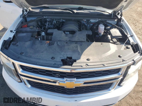 2015 Chevrolet Tahoe Commercial with VIN 1GNLC2EC2FR571987, listed as a Copart auction lot 45346895 with 106,708 mi miles and Salvage title. Bid and sale history available at DreamBid. Image 11.