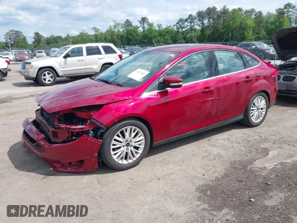 2016 Ford Focus Titanium with VIN 1FADP3J22GL314021, listed as a IAAI auction lot 42212462 with 142,370 mi miles and . Bid and sale history available at DreamBid. Image 2.