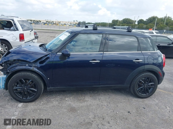 2013 MINI Countryman with VIN WMWZB3C58DWM07817, listed as a IAAI auction lot 41962291 with 60,763 mi miles and . Bid and sale history available at DreamBid. Image 15.