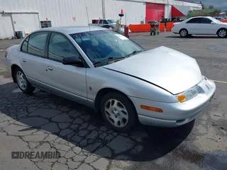 2002 Saturn SL with VIN 1G8ZK527X2Z250900, listed as a IAAI auction lot 42298635 with 128,914 mi miles and . Bid and sale history available at DreamBid. Image 1.