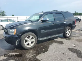 2012 Chevrolet Tahoe LT with VIN 1GNSCBE03CR259836, listed as a Copart auction lot 60796305 with 258,387 mi miles and Salvage title. Bid and sale history available at DreamBid. Image 1.
