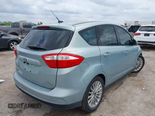 2014 Ford C-Max SE z VIN 1FADP5AU7EL508750, wystawiony jako IAAI lot #42139897 z przebiegiem 117 685 mil mil oraz . Historia ofert i sprzedaży dostępna na DreamBid. Obrazek 4.