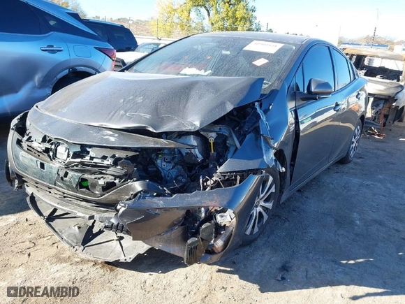2021 Toyota Prius Prime LE with VIN JTDKAMFP4M3178919, listed as a IAAI auction lot 40902821 with 43,647 mi miles. Bid and sale history available at carsss.com. Image 2.