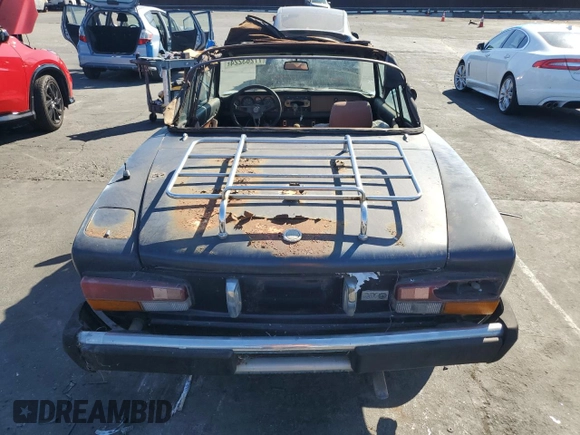 1979 FIAT 124 Spider z VIN 124C520160260, wystawiony jako Copart lot #77263224 z przebiegiem 68 917 mil mil oraz Czysty tytuł • Clean title. Historia ofert i sprzedaży dostępna na DreamBid. Obrazek 6.
