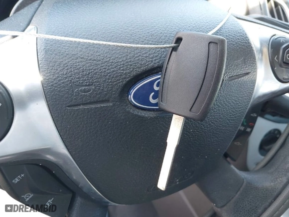 2013 Ford Focus SE with VIN 1FADP3K25DL302844, listed as a IAAI auction lot 42030154 with 226,755 mi miles. Bid and sale history available at carsss.com. Image 11.