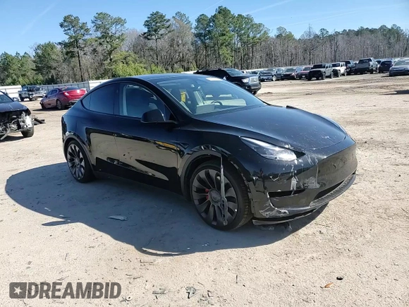 2023 Tesla Model Y Performance with VIN 7SAYGDEF2PF828973, listed as a Copart auction lot 45276585 with 15,750 mi miles and Salvage Title. Bid and sale history available at DreamBid. Image 12.
