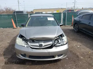 2004 Honda Civic LX with VIN 1HGES16564L001099, listed as a IAAI auction lot 41830582 with 157,151 mi miles. Bid and sale history available at carsss.com. Image 12.