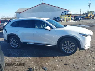 2023 Mazda CX-9 Grand Touring with VIN JM3TCBDY4P0633456, listed as a IAAI auction lot 41510127 with 24,706 mi miles and . Bid and sale history available at carsss.com. Image 13.