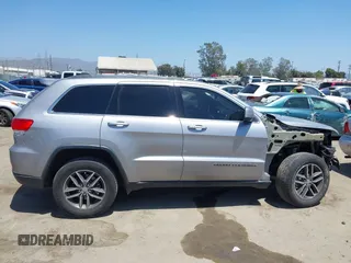 2018 Jeep Grand Cherokee Laredo E with VIN 1C4RJEAG2JC429850, listed as a IAAI auction lot 42541574 with 72,009 mi miles and . Bid and sale history available at DreamBid. Image 14.