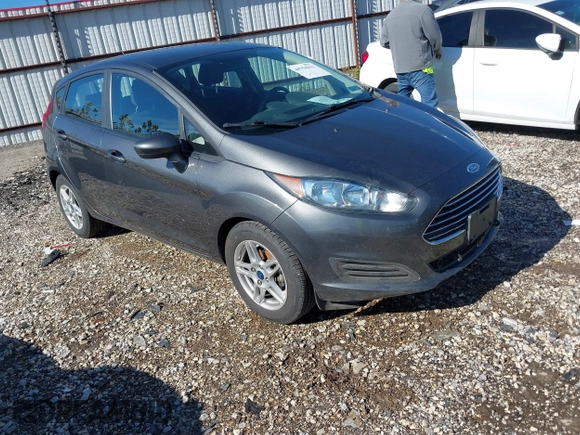 2019 Ford Fiesta SE with VIN 3FADP4EJ7KM138162, listed as a IAAI auction lot 40754211 with 51,886 mi miles. Bid and sale history available at carsss.com. Image 1.