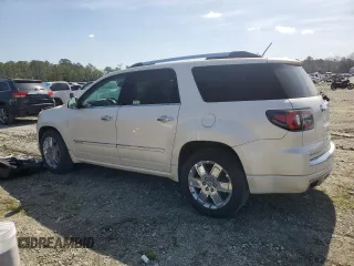 2014 GMC Acadia Denali z VIN 1GKKRTKD9EJ167320, wystawiony jako Copart lot #46899175 z przebiegiem 128 664 mil mil oraz Szkoda całkowita • Salvage title. Historia ofert i sprzedaży dostępna na DreamBid. Obrazek 2.