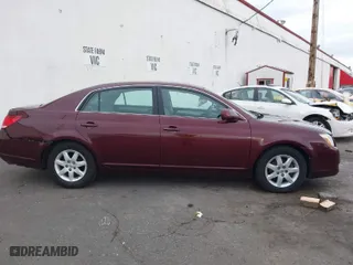 2005 Toyota Avalon XL with VIN 4T1BK36B65U062012, listed as a IAAI auction lot 38430672 with 150,383 mi miles. Bid and sale history available at carsss.com. Image 13.