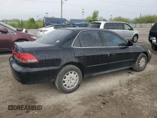 2001 Honda Accord LX z VIN 1HGCG56401A047218, wystawiony jako Copart lot #55053285 z przebiegiem 214 849 mil mil oraz Szkoda całkowita • Salvage title. Historia ofert i sprzedaży dostępna na DreamBid. Obrazek 3.