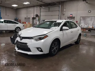 2016 Toyota Corolla L with VIN 2T1BURHE6GC726656, listed as a IAAI auction lot 40996590 with 124,976 mi miles and . Bid and sale history available at DreamBid. Image 2.