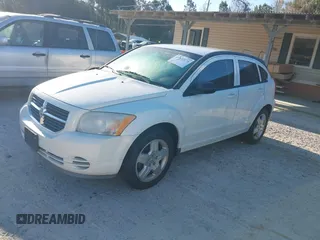 2009 Dodge Caliber SXT with VIN 1B3HB48A39D233105, listed as a IAAI auction lot 41872576 with Not Provided miles and . Bid and sale history available at DreamBid. Image 2.