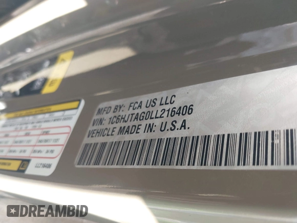 2020 Jeep Gladiator Sport S with VIN 1C6HJTAG0LL216406, listed as a IAAI auction lot 41991629 with 180,125 mi miles and . Bid and sale history available at DreamBid. Image 9.