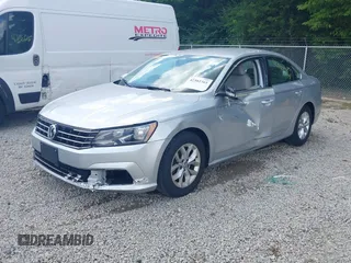2016 Volkswagen Passat S with VIN 1VWAT7A33GC040009, listed as a IAAI auction lot 42582361 with 91,961 mi miles and . Bid and sale history available at DreamBid. Image 2.