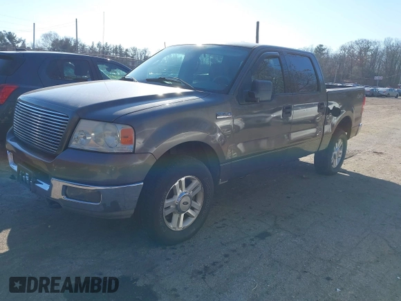 2004 Ford F-150 XLT with VIN 1FTRW14W84KC86653, listed as a IAAI auction lot 41376192 with 188,506 mi miles. Bid and sale history available at carsss.com. Image 2.